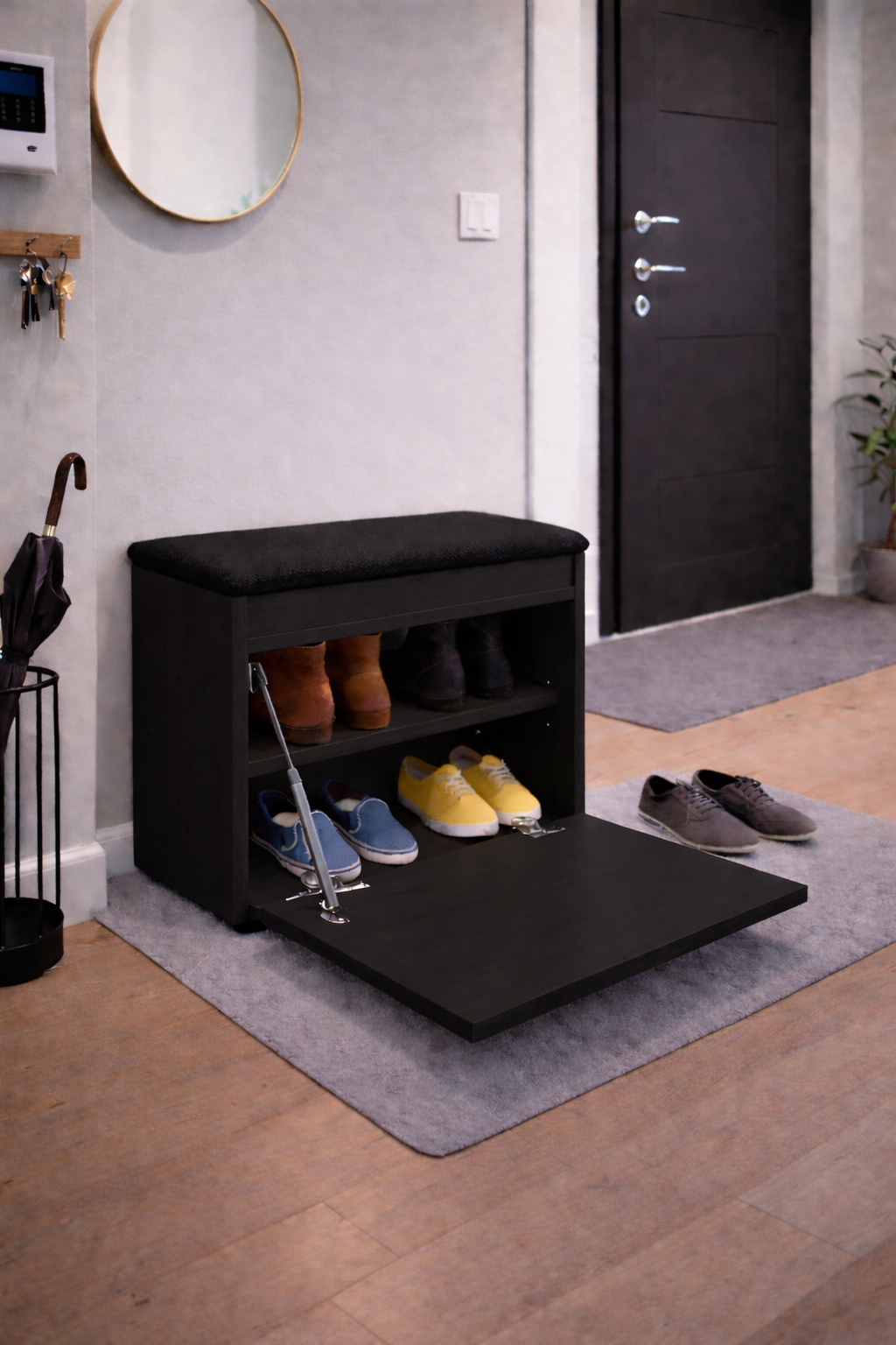 Czarna szafka na buty z siedziskiem i schowkiem do przedpokoju Lumo
